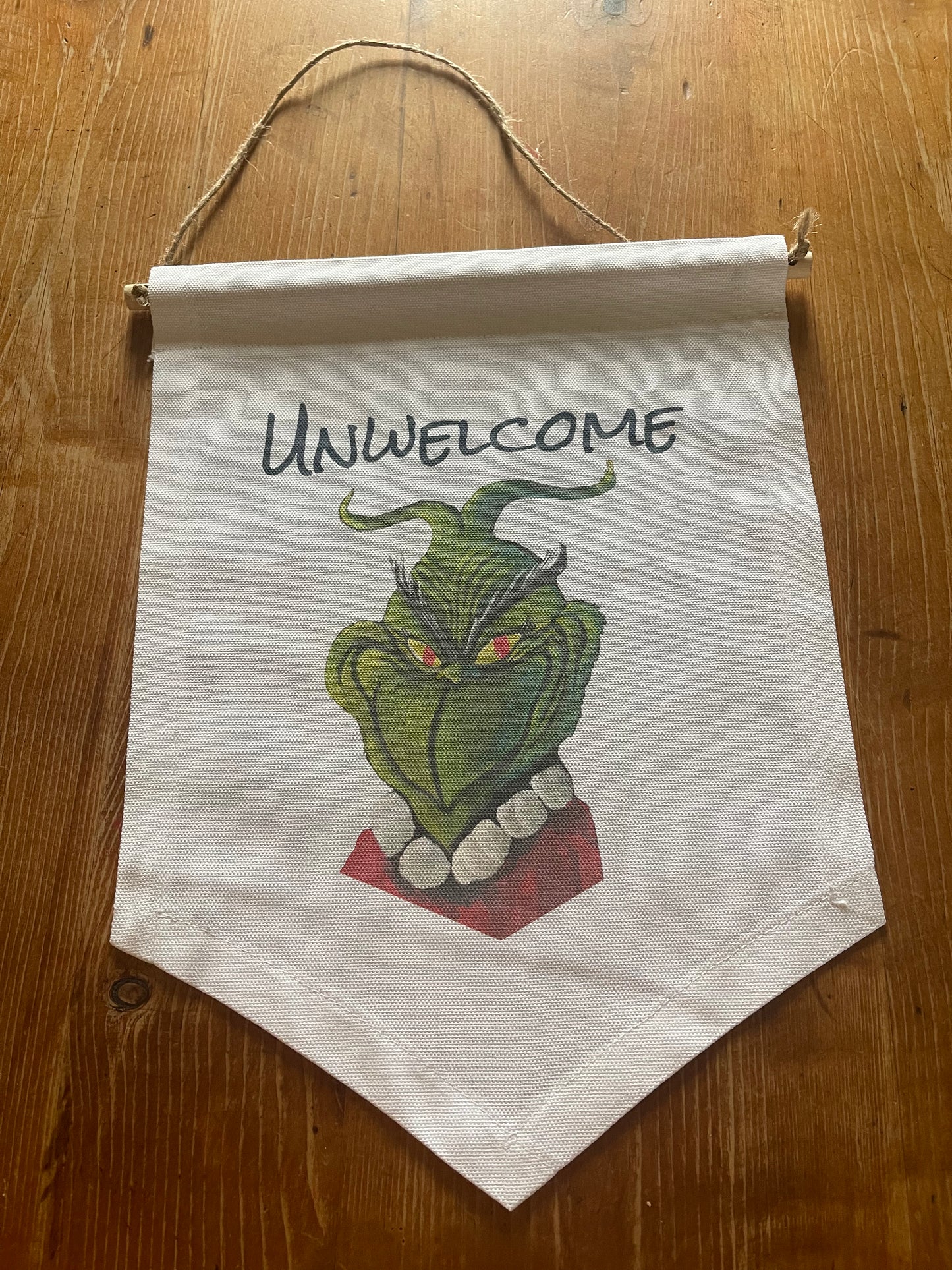 Unwelcome Grinch Banner